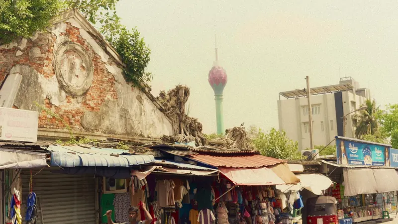 Old Colombo wall and stalls with the Lotus Tower behind