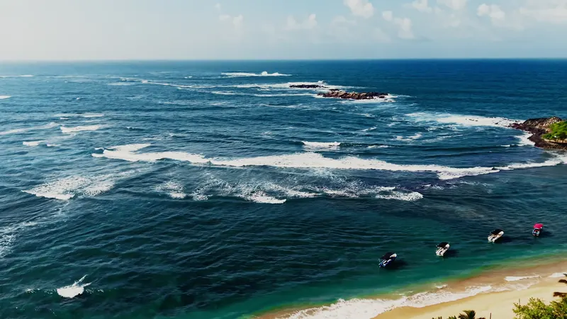 Waves breaking over the reef at Unawatuna