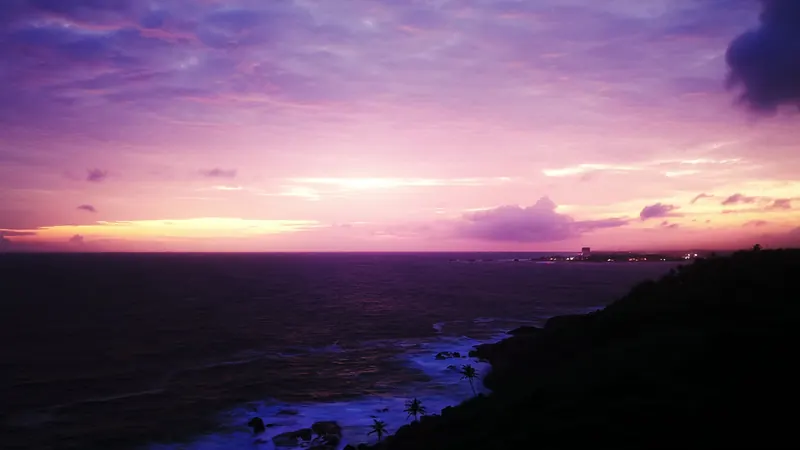 Purple sunset over the sea at Unawatuna