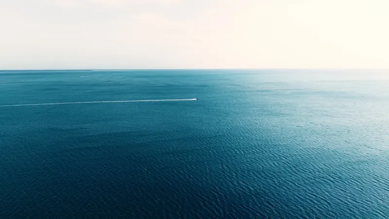 Pale sky meeting the sea at Pasikudah